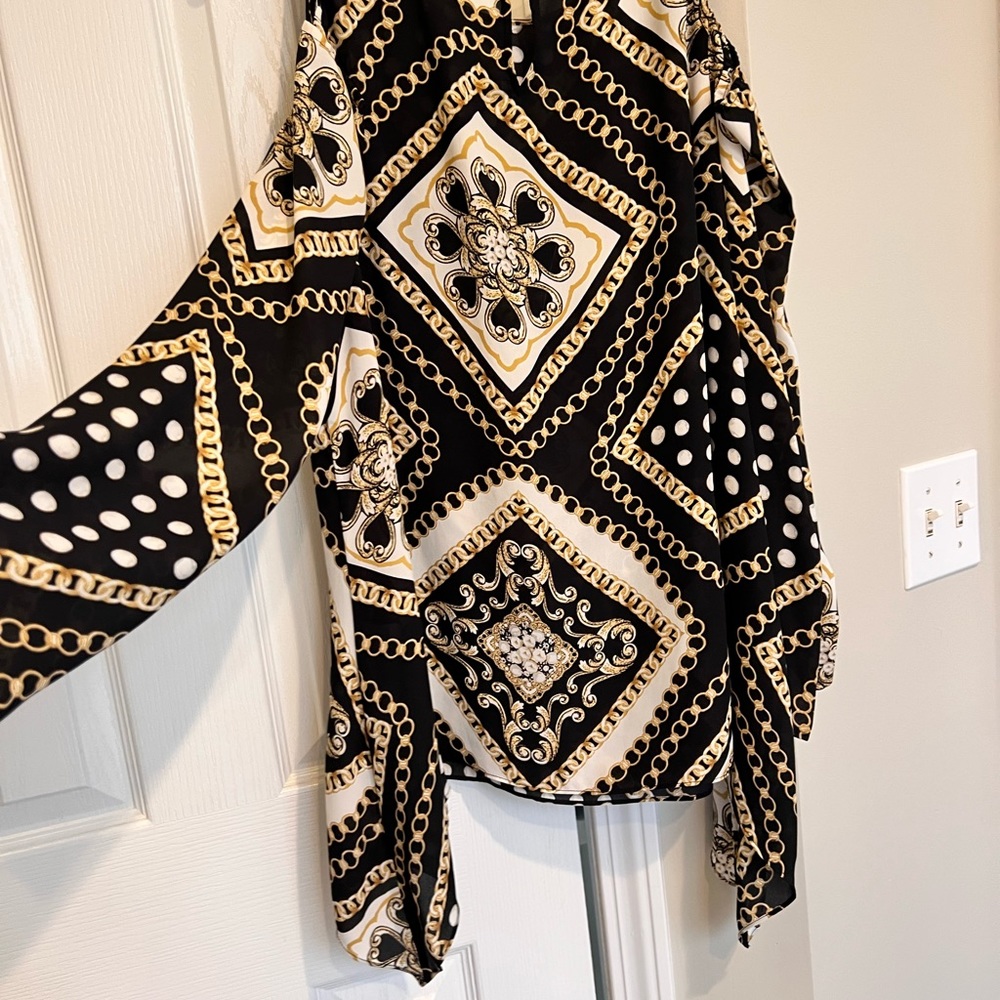 GORGEOUS Black, gold and white off the shoulder Chico’s blouse. Great condition.